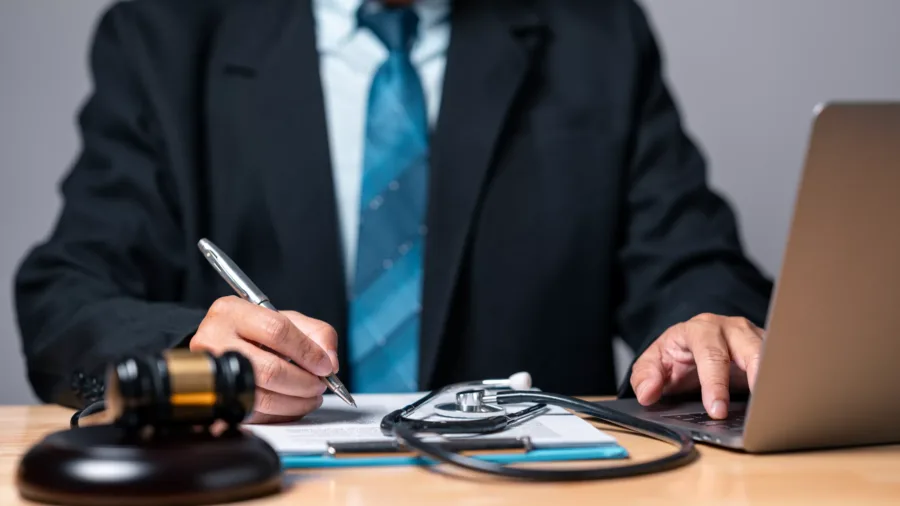 Personal injury law concept. The expertise of a lawyer becomes paramount when seeking fair legal resolutions in medically intricate scenarios.